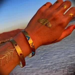 Фото пример золотистой татуировки золотом 07.09.22 №0051 - tatufoto.com