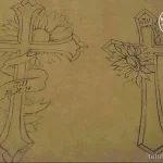 Эскиз татуировки, изображающий крест, украшенный подсолнухом и лентой с надписью. Нежный и символичный рисунок в черно-серых тонах.