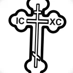 Фото тату православного креста с надписями IC и XC. Эскиз татуировки в черном цвете, выполненный в строгом и лаконичном стиле.