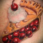 Фото пример татуировки с рисунком пирога 24.01.23 №0259 - tatufoto.com