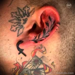 Фото рисунка татуировки на ухе 11.01.23 №0162 - tatufoto.com