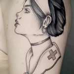 Татуировка медсестра с повязанным на шее шарфиком нанесена на левое плечо девушке - tatufoto.com 110223 - 152