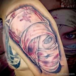 Татуировка с портретом окровавленного изобинтованного лица медсестры - tatufoto.com 110223 - 178