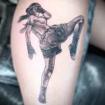 татуировка девушка боец мой тай носит удар колена - tatufoto.com 05022023