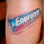 татуировка с рисунком батарейки Energizer на левой ноге - tatufoto.com 180223 - 041