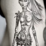 необычная татуировка с девушкой куклой - tatufoto.com 180323 - 010
