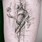 рисунок татуировки космонавт в скафандре и дерево