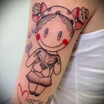 рисунок татуировки с улыбчивой куклой на плече девушки - tatufoto.com 180323 - 065