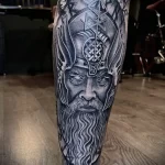 татуировка Воин в шлеме и скандинавские руны на ноге - tatufoto.com 080323 - 041