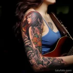 A woman with a sleeve tattoo of various musical symbols and instruments, playing a guitar in a music studio 2 - 07,11,2023 tatufoto.com
