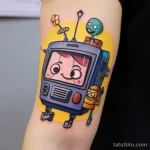 Cartoon style TV tattoo with playful characters on t fe e a b adacc _1 181123 tatufoto.com