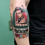 Close up of a vintage TV tattoo on a forearm with in cdc cd a f ffcaba _1 181123 tatufoto.com