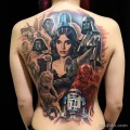 Detailed tattoo of iconic movie characters from 'Star Wars' on a person's back 2_2 16.11.2023 tatufoto.com 28
