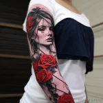 Hand holding a red tape beautiful drawing of a tatto cbbb fe a bbbeacc _1_2_3 231123 tatufoto.com