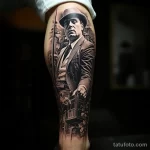 Intricate tattoo featuring a scene from 'The Godfather' on a calf 3_3 16.11.2023 tatufoto.com 39