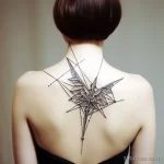 . Origami crane in flight on shoulder blade 16.11.2023 tatufoto.com 030