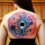 . Retro vinyl record on lower back. tattoo v 16.11.2023 tatufoto.com 041