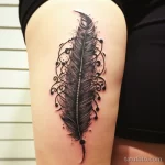 . Stylized quill and ink on ribcage. tattoo v 16.11.2023 tatufoto.com 051