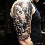 уник тату фото Tattoo of Santa Claus walking through a snowy forest, located on the bicep 4_2 13.11.2023 tatufoto.com 52
