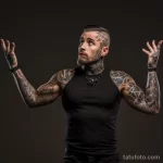 A tattooed individual pointing to a question on a FA effc df a ccccff 161223 tatufoto.com 072