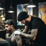 Consultation with a professional tattooist styliz cedf dd bec baf 051223 tatufoto.com