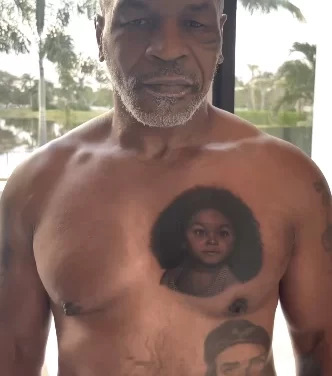 Новая татуировка Майка Тайсона с портретом дочери на левой части груди у сердца
