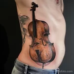 Рисунок тату с виолончелью - The man had a discreet cello tattoo on his side that cbaf d ab b aef _1_2_3 - 291223 tatufoto.com 352