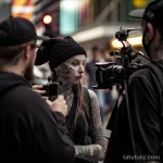 тату на лице - A film crew on the street asks the girl with a face b a ca b eb _1 - 261223 tatufoto.com 006