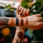 Цвета для тату - A person comparing tattoo colors against their skin dbc f ad a dcebd _1 - 030124 tatufoto.com 094