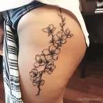 Интимное тату на фото - Cherry blossom tattoo on the side hip style raw f d fd bd eff - 080224 tatufoto.com 090