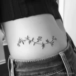 Интимное тату на фото - Delicate vine tattoo on the side waist style raw e db bc afdfcb _1 - 080224 tatufoto.com 191