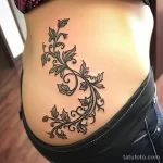 Интимное тату на фото - Elegant vine tattoo winding along the side hip st aff e f bdbbe _1 - 080224 tatufoto.com 216