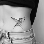 Интимное тату на фото - Minimalist bird tattoo on the side waist style ra bbeab d cd f _1 - 080224 tatufoto.com 296