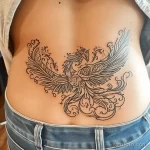 Интимное тату на фото - Phoenix tattoo rising from the pelvic area style cfa a ef bda dee - 080224 tatufoto.com 332