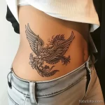 Интимное тату на фото - Phoenix tattoo rising from the pelvic area style cfa a ef bda dee _1 - 080224 tatufoto.com 333