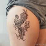 Интимное тату на фото - Phoenix tattoo rising from the pelvic area style cfa a ef bda dee _1_2 - 080224 tatufoto.com 334