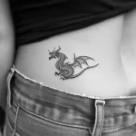 Интимное тату на фото - Small dragon tattoo on the lower abdomen style ra bfaa e f ad dadffa _1 - 080224 tatufoto.com 386