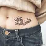 Интимное тату на фото - Small dragon tattoo on the lower abdomen style ra bfaa e f ad dadffa _1_2 - 080224 tatufoto.com 387