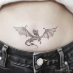Интимное тату на фото - Small dragon tattoo on the lower abdomen style ra bfaa e f ad dadffa _1_2_3 - 080224 tatufoto.com 388