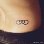 Интимное тату на фото - Small infinity symbol tattoo on the lower back st bbba ecc cb ea fbc _1_2_3 - 080224 tatufoto.com 400