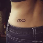 Интимное тату на фото - Small infinity symbol tattoo on the lower back st efcad fec ec c cabadde _1 - 080224 tatufoto.com 402