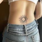 Интимное тату на фото - Small sun tattoo on the lower back style raw st efd aba bb b facfc - 080224 tatufoto.com 422