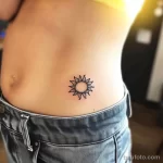 Интимное тату на фото - Tiny sun tattoo on the lower abdomen style raw bcb a ccf a cfb _1_2 - 080224 tatufoto.com 535