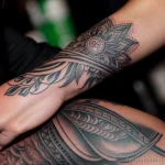 00039-Young woman with detailed hand tattoo, at a party, feeling misunderstood 1464492548 tatufoto.com 034 tatufoto.com 034