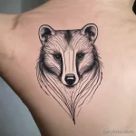 Minimalist badger tattoo with fine lines and negative space. tatufoto.com 03 10 24 06 17_72