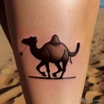 Realistic camel tattoo with sand blowing tatufoto.com 187