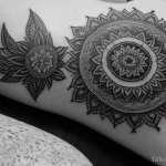 black and white mandala tattoo on a woman’s thigh, detailed shot tattoo lion, on neck sexy girl, photorealistic, tatufoto.com 263