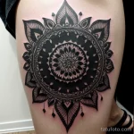 black and white mandala tattoo on a woman’s thigh, detailed shot, tatufoto.com 291