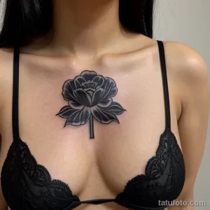 black carnation tattoo on the chest tatufoto.com 024