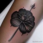 close-up of a black carnation tattoo on a woman s tatufoto.com 230